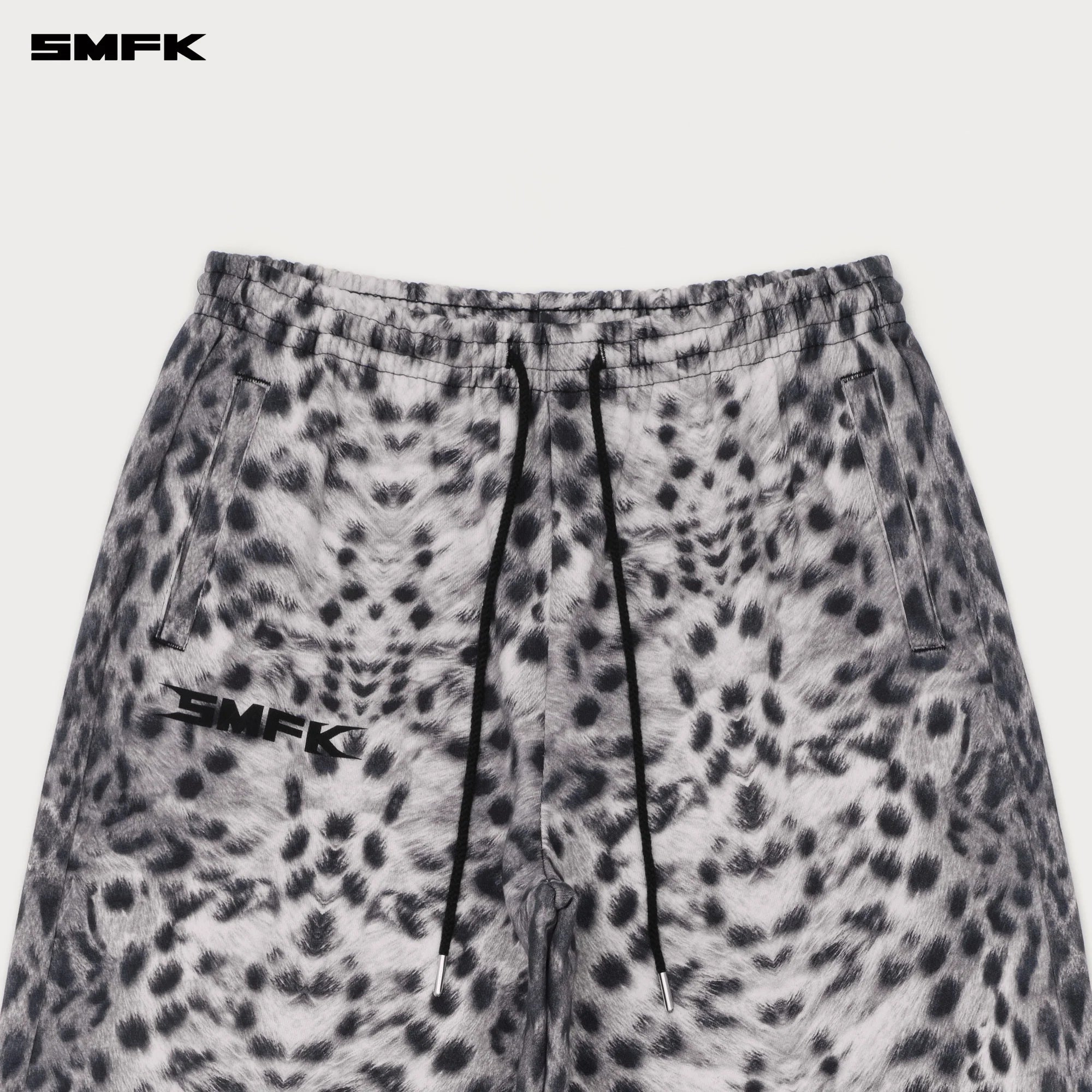 FUTURE GENE WIDE-LEG SWEATPANTS IN WHITE LEOPARD