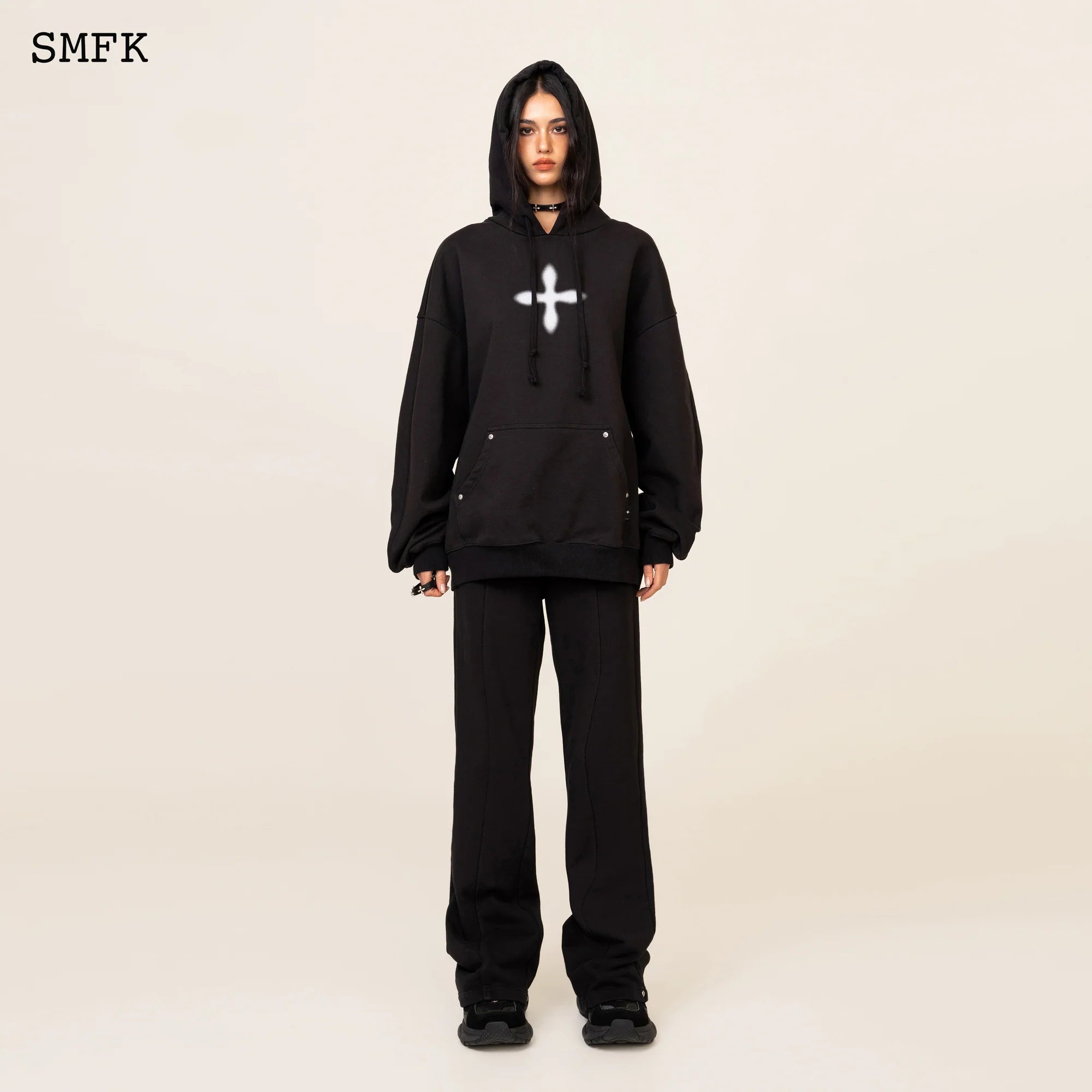 COMPASS CLASSIC CROSS FLARED SWEATPANTS IN BLACK