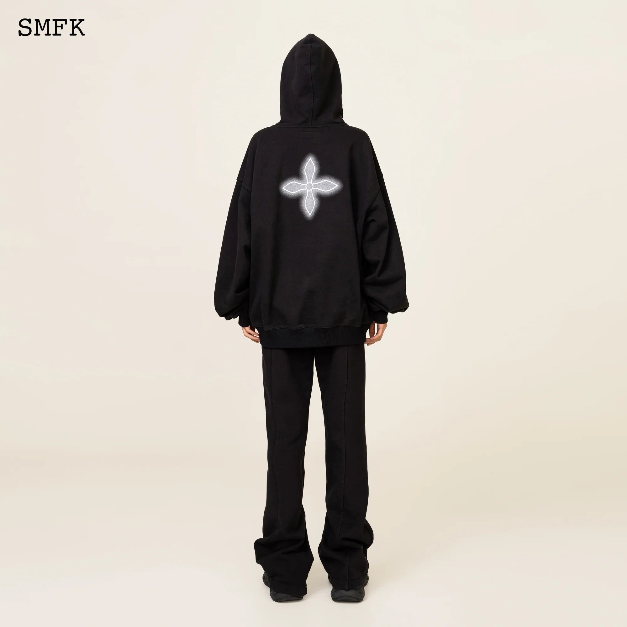 COMPASS CLASSIC CROSS FLARED SWEATPANTS IN BLACK