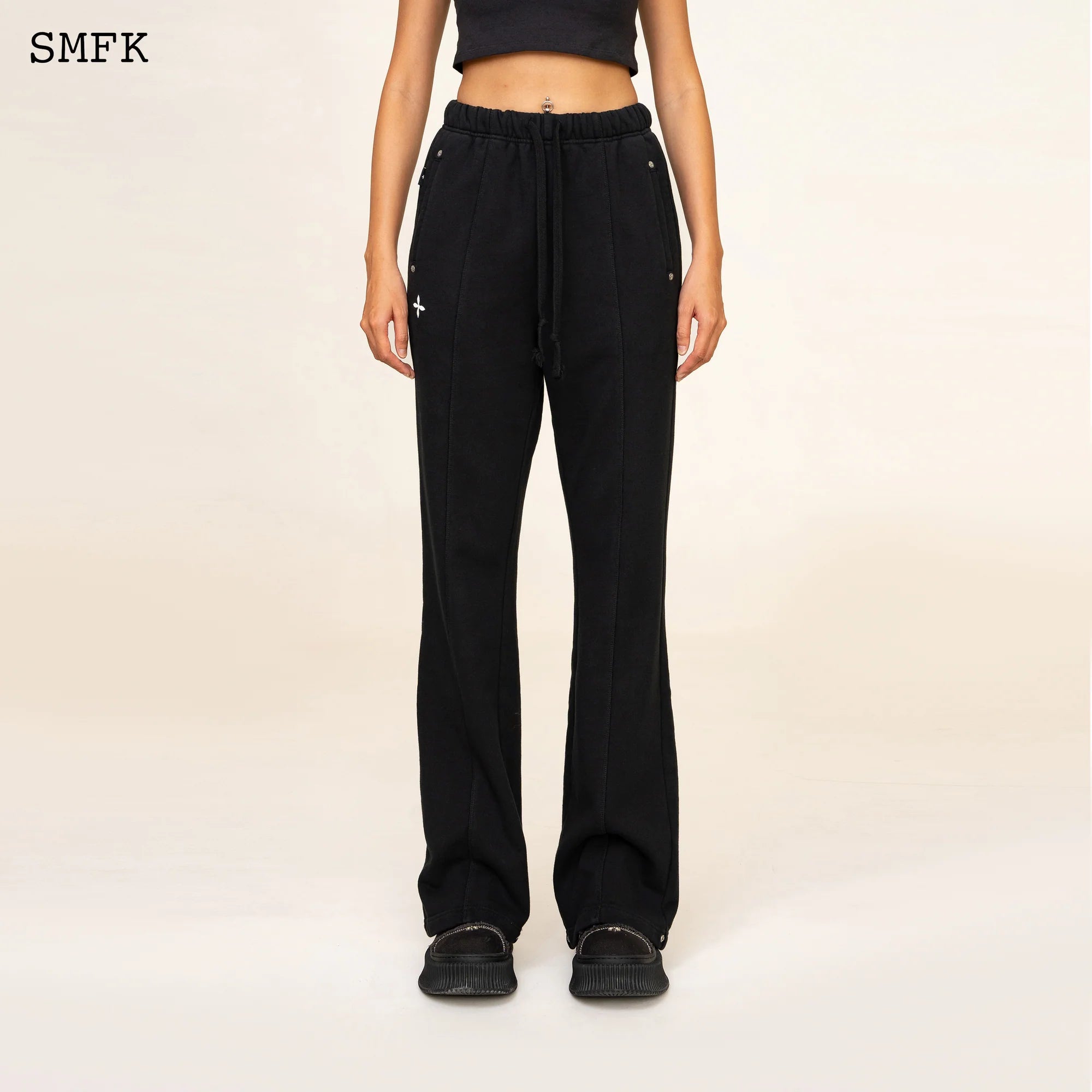 COMPASS CLASSIC CROSS FLARED SWEATPANTS IN BLACK