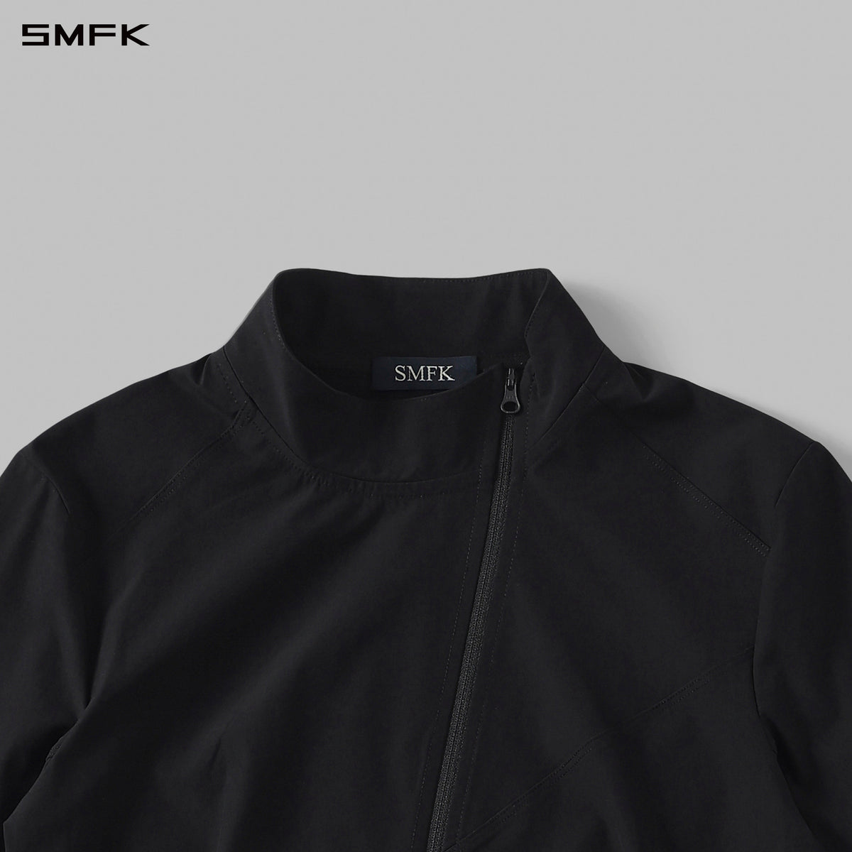 FOCUS OD SLIM ASYMMETRI-ZIP JACKET/66Nylon WILD BLACK