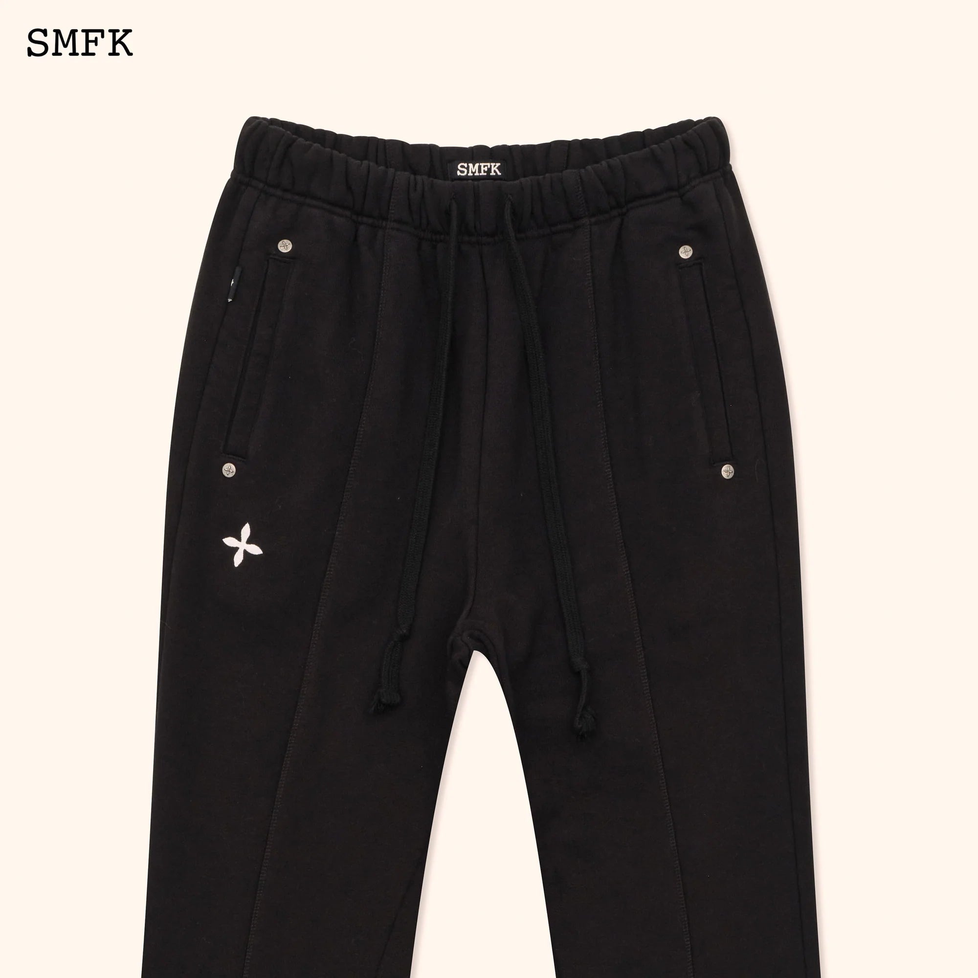 COMPASS CLASSIC CROSS FLARED SWEATPANTS IN BLACK