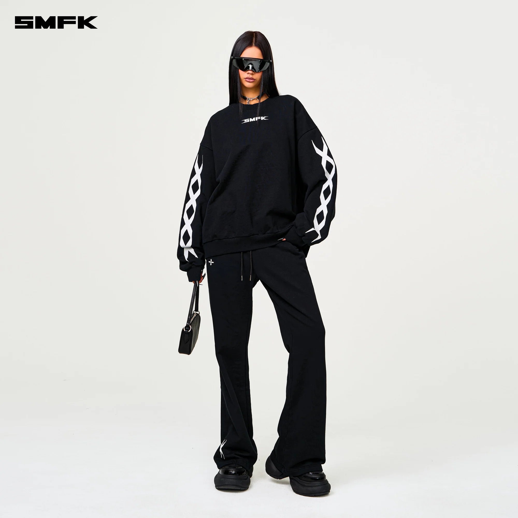 COMPASS CROSS CLASSIC FLARED TRACK PANTS IN BLACK