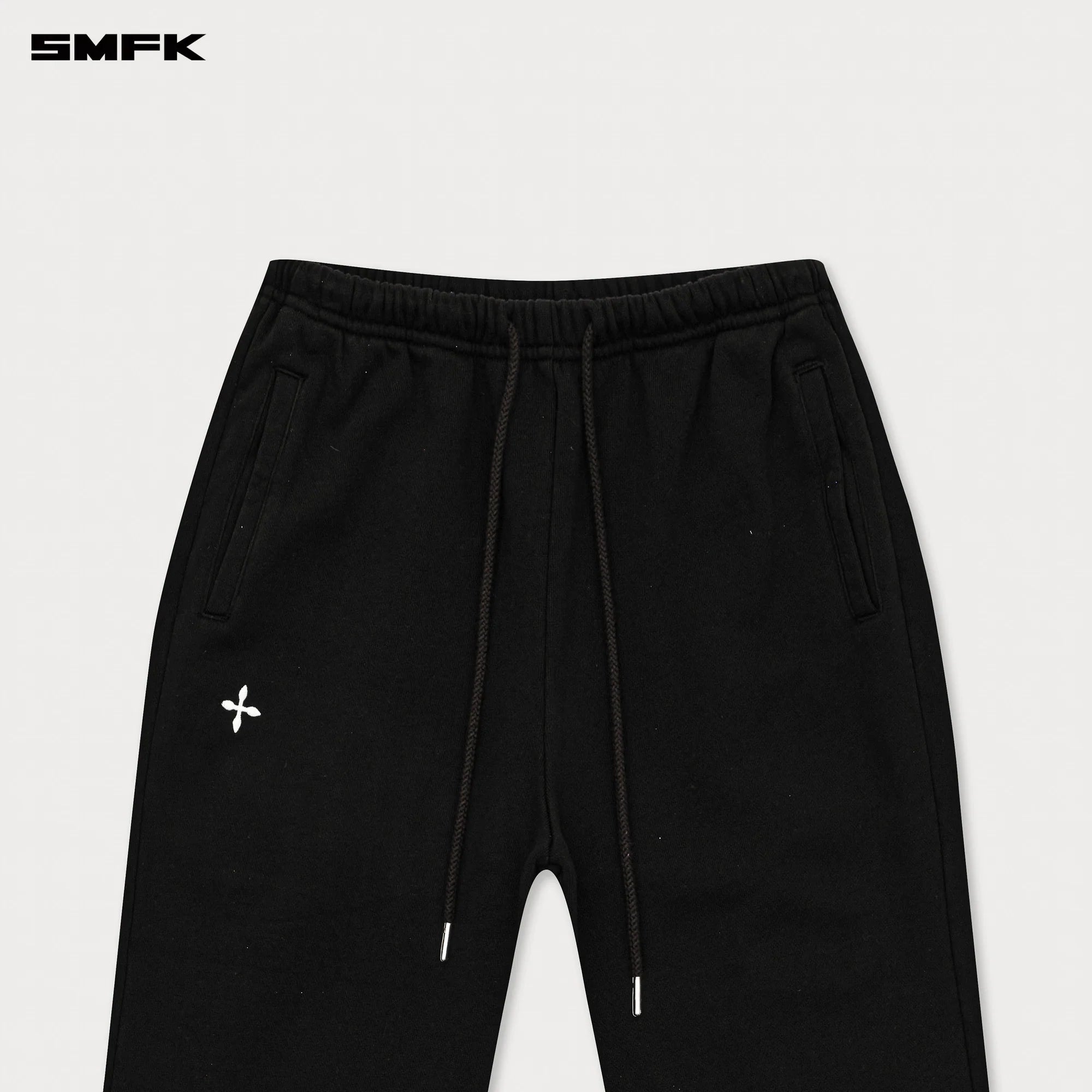 COMPASS CROSS CLASSIC FLARED TRACK PANTS IN BLACK