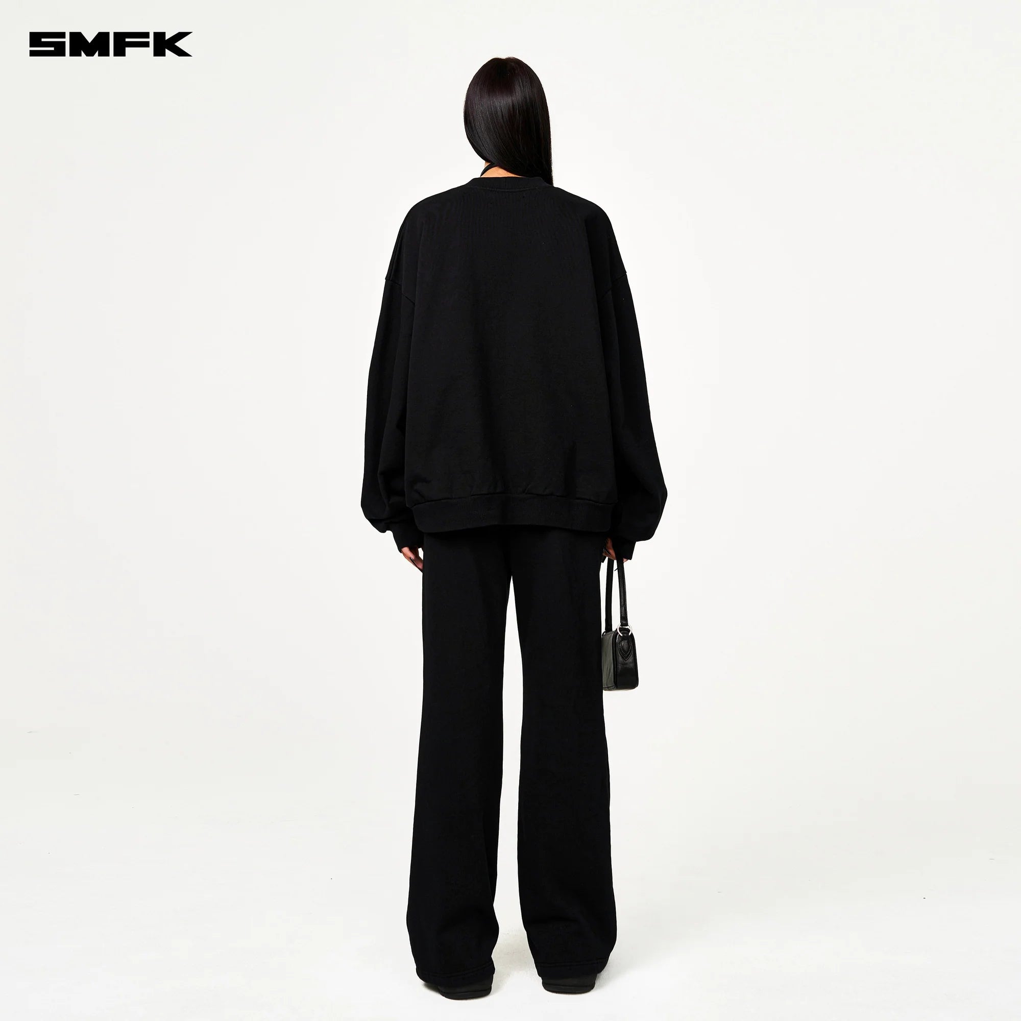 COMPASS CROSS CLASSIC FLARED TRACK PANTS IN BLACK
