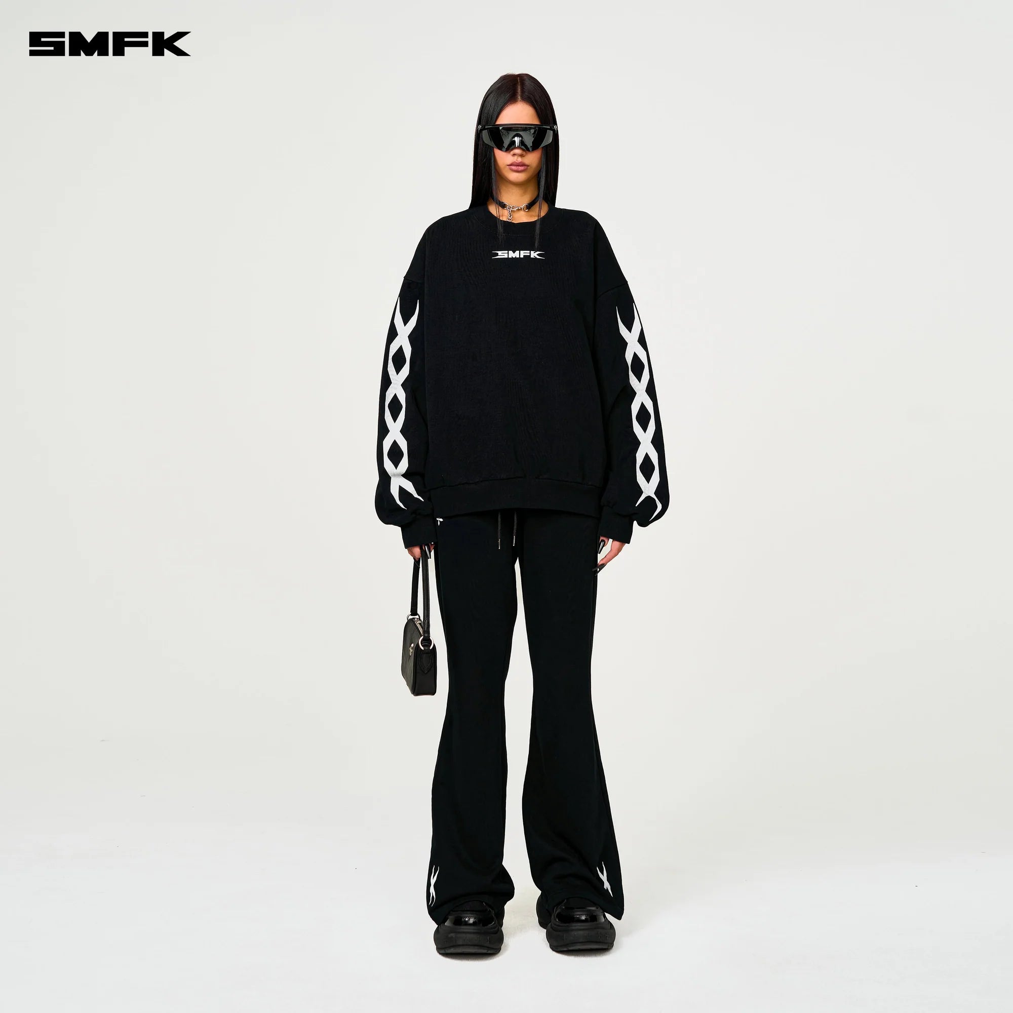 COMPASS CROSS CLASSIC FLARED TRACK PANTS IN BLACK