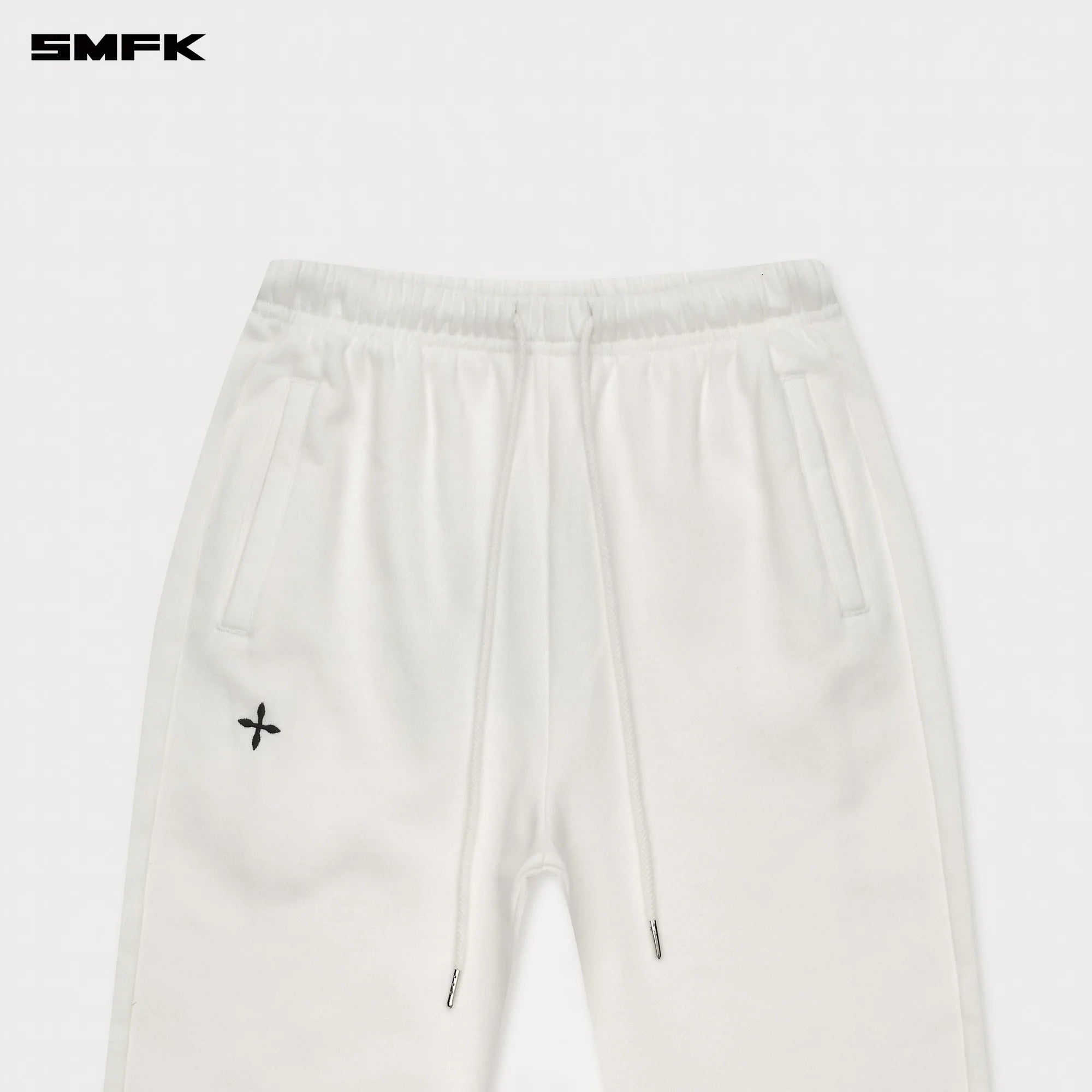 COMPASS CROSS CLASSIC FLARED TRACK PANTS IN WHITE