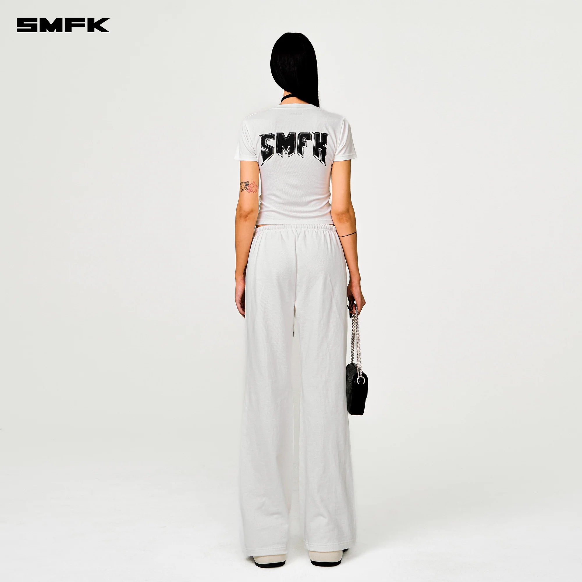 COMPASS CROSS CLASSIC FLARED TRACK PANTS IN WHITE