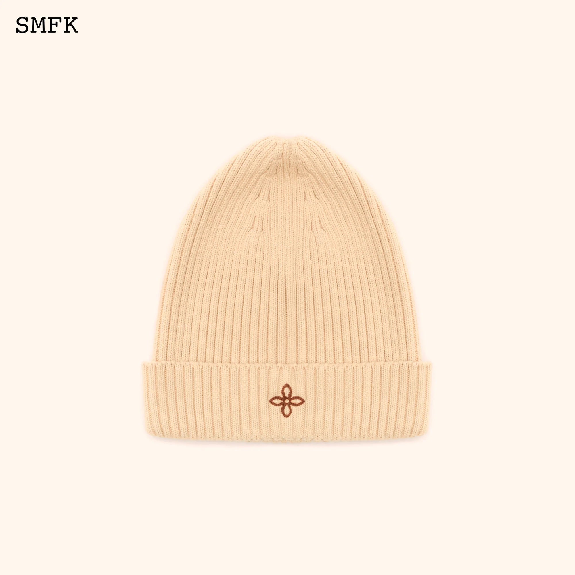 COMPASS CROSS COTTON BEANIE HAT IN WHEAT