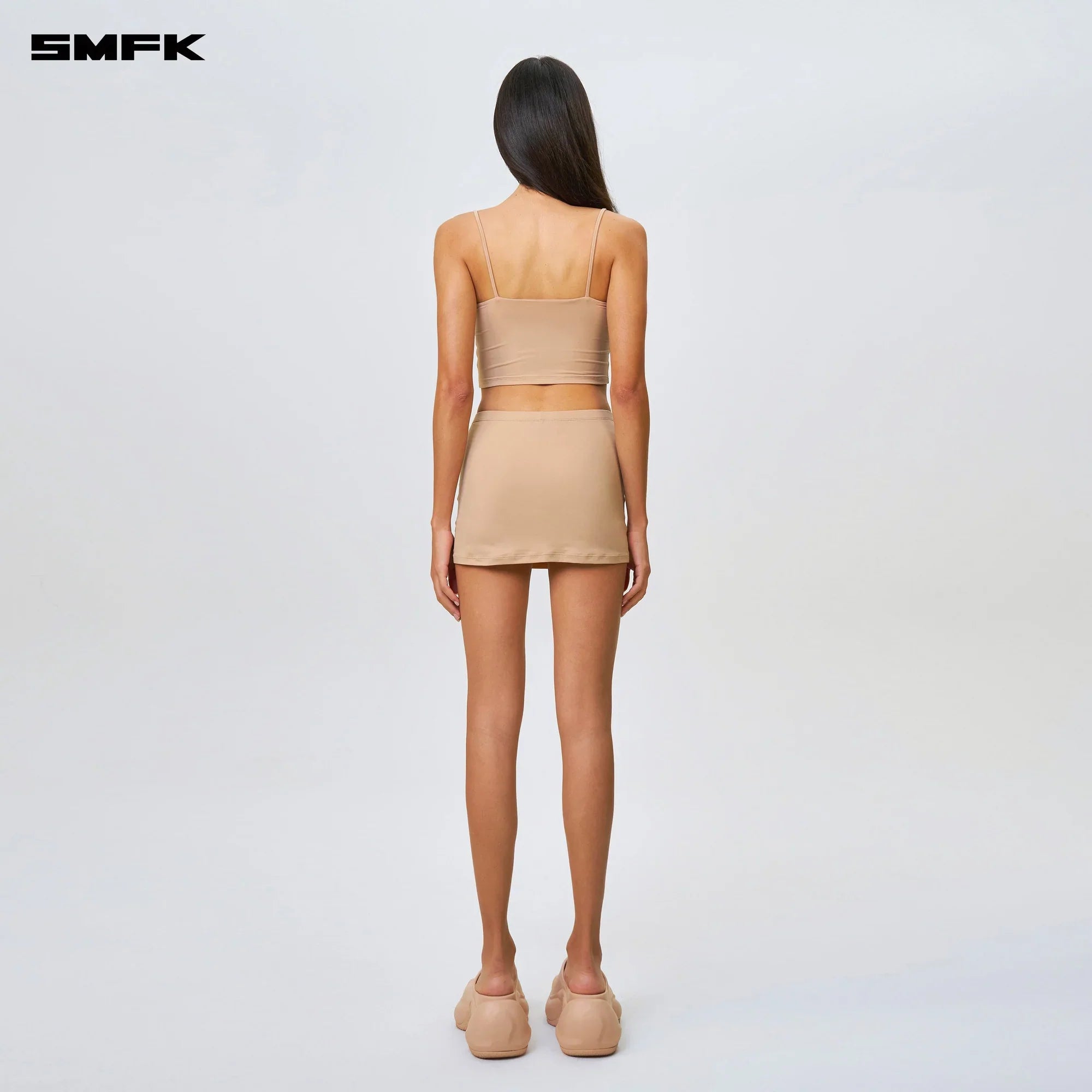 COMPASS HUG SKIN MINI SKIRT NUDE
