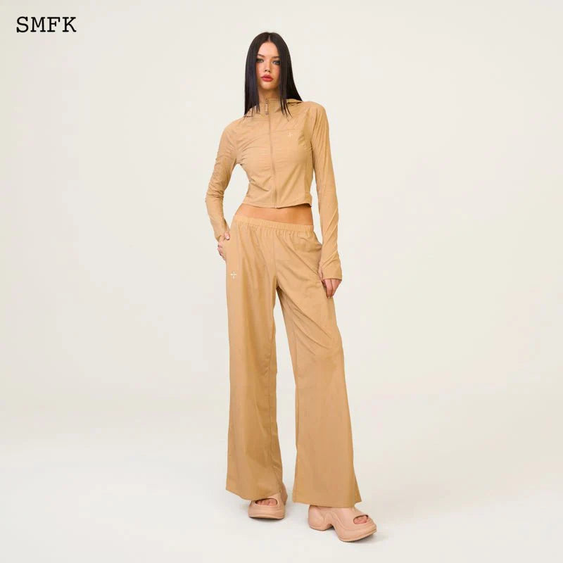 COMPASS HUG SUN-PROOF SUPER LIGHT FLARED PANTS NUDE