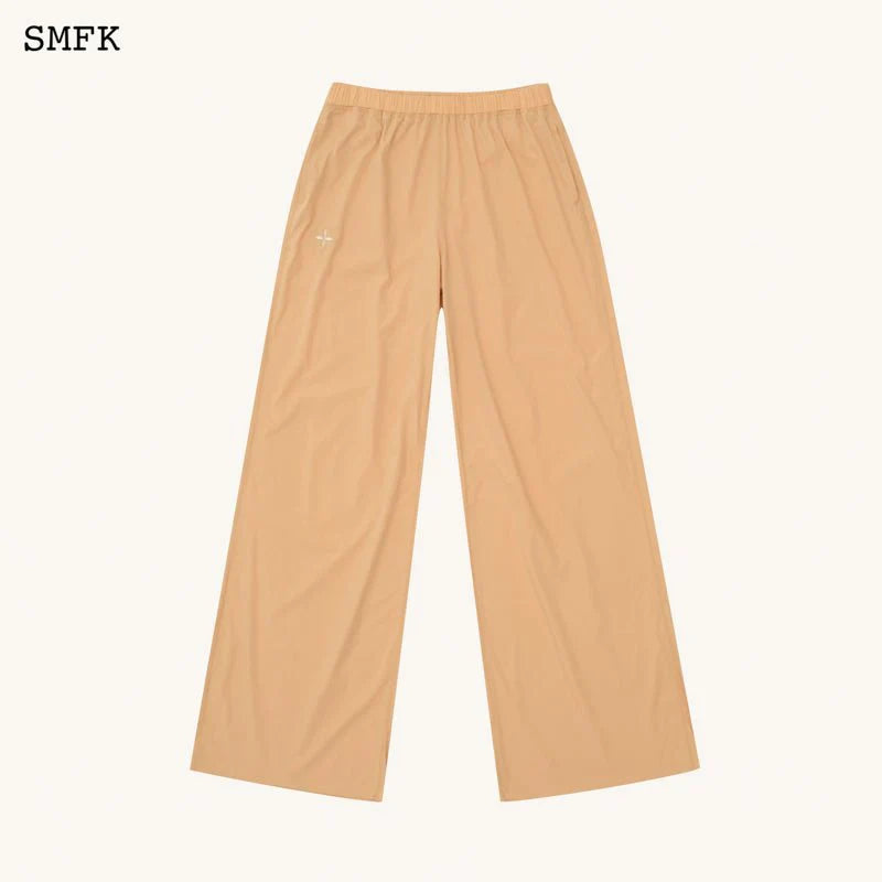 COMPASS HUG SUN-PROOF SUPER LIGHT FLARED PANTS NUDE