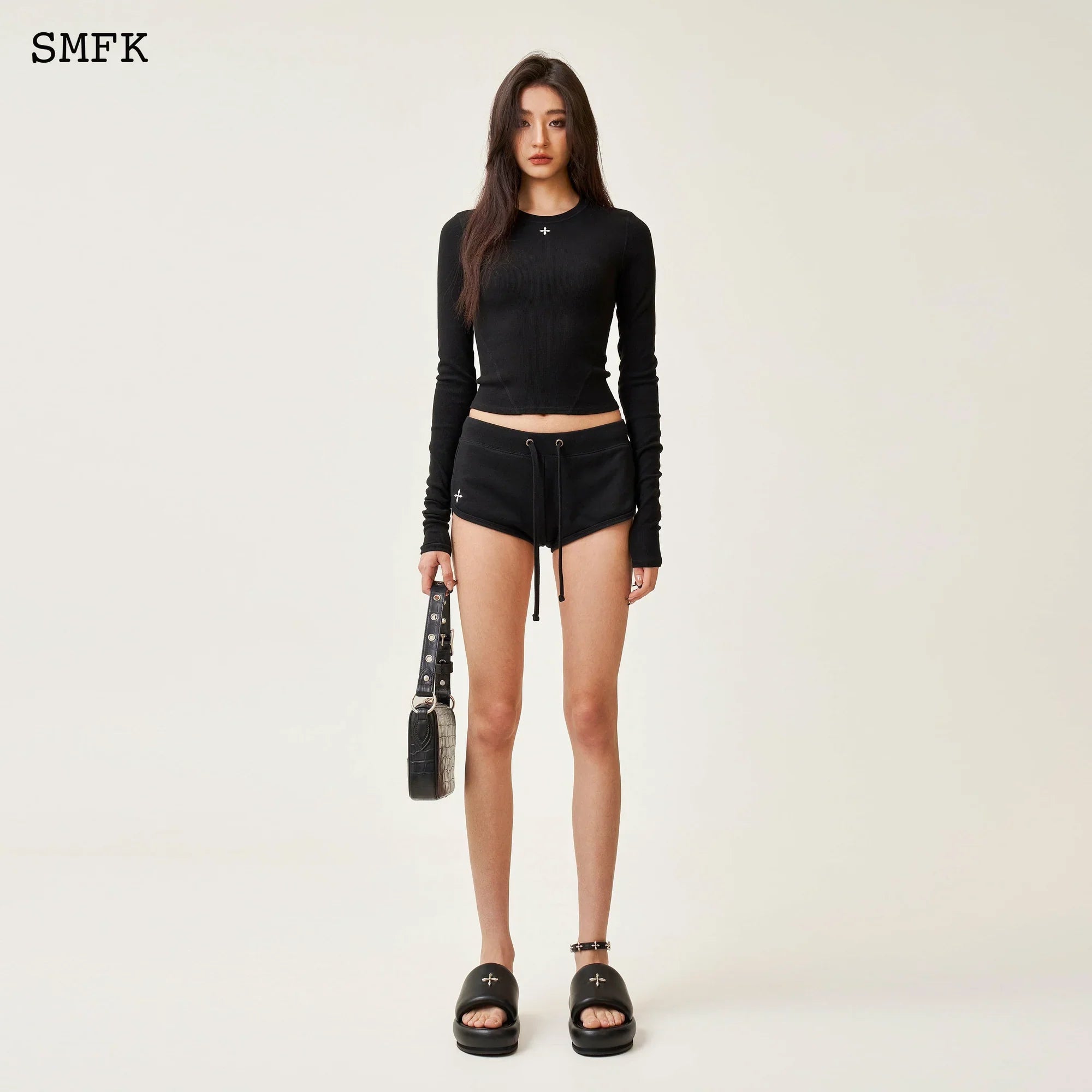 SMFK COMPASS RUSH SLIM FIT SPORTS TOP IN BLACK