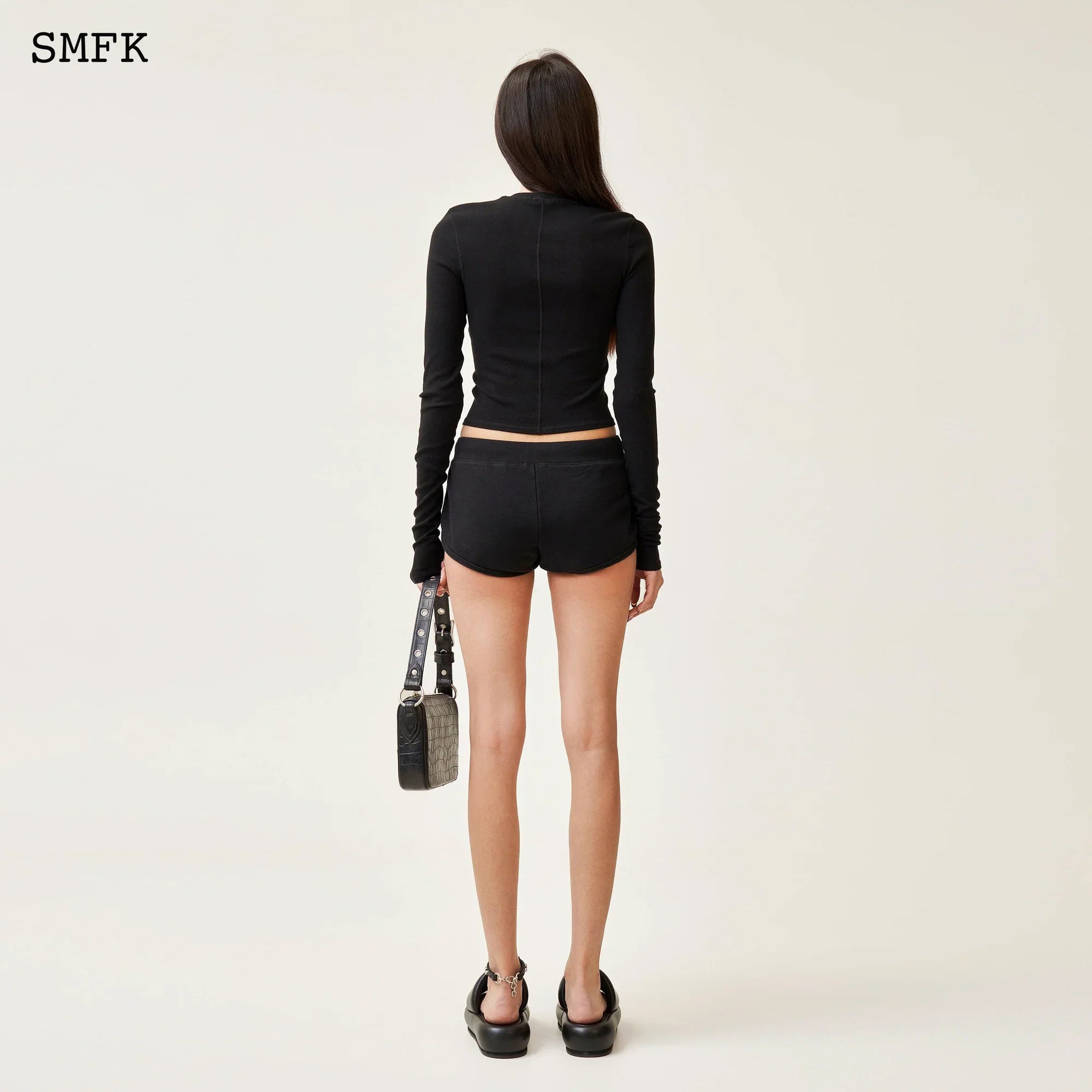 SMFK COMPASS RUSH SLIM FIT SPORTS TOP IN BLACK
