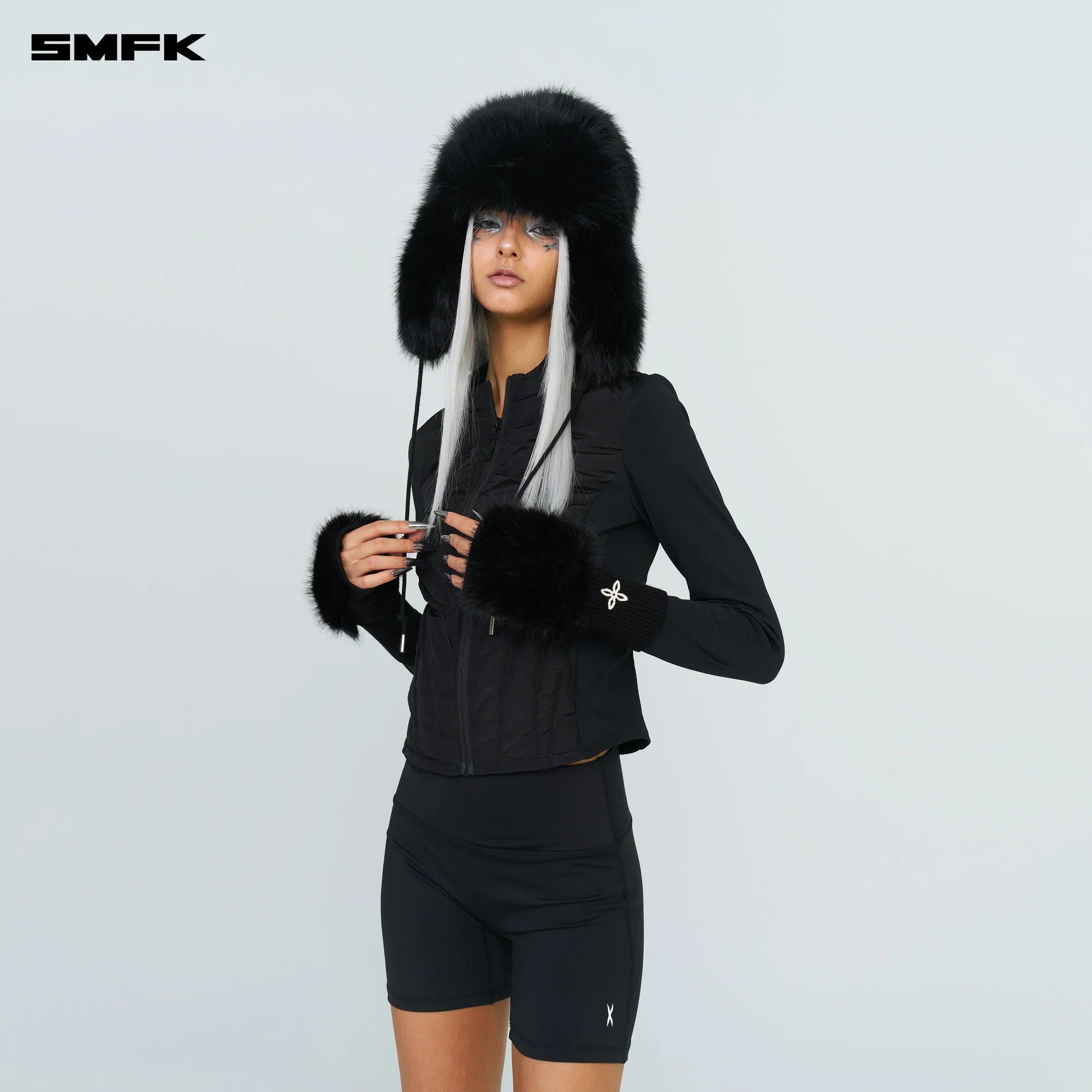 SMFK COMPASS SNOWMAN FAUX FUR HAT IN BLACK