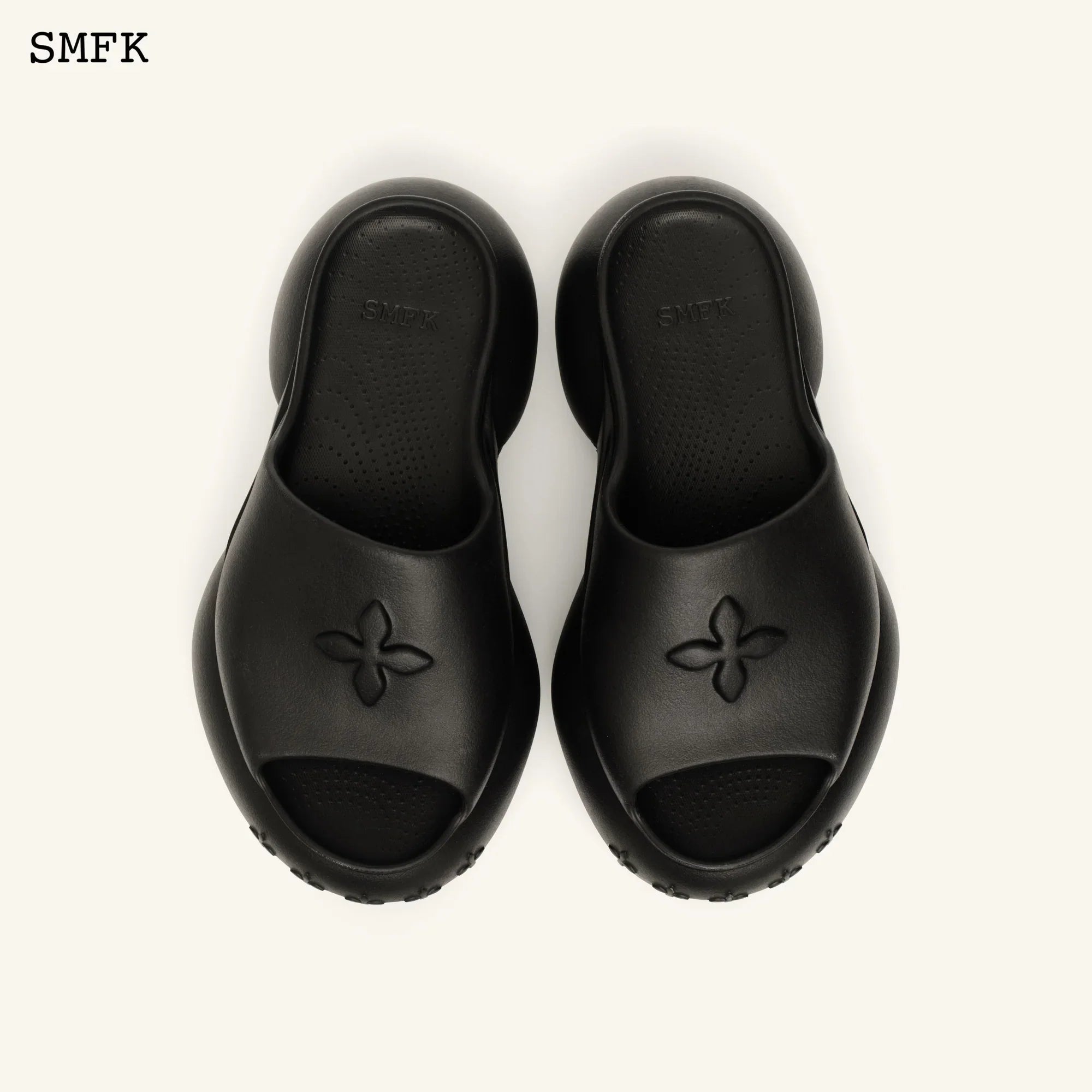 COMPASS WAVE PLATFORM BUMPER SANDAL IN BLACK