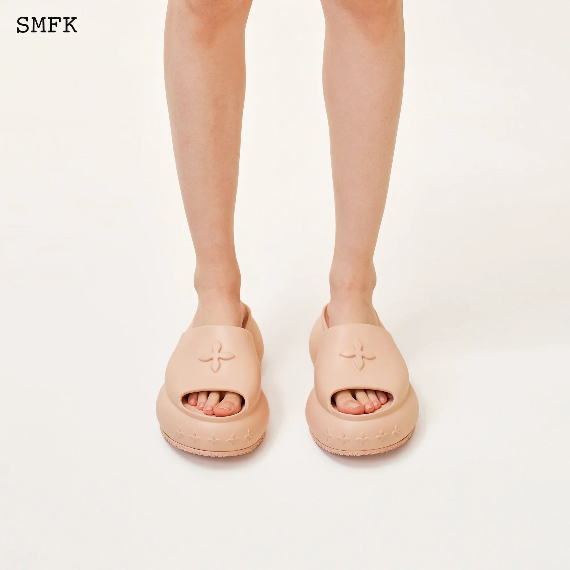 COMPASS WAVE PLATFORM BUMPER SANDAL IN NUDE